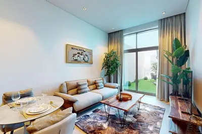 a living room with a couch and a table at 15 Northside Tower 2 - Spacious One Bedroom in Dubai