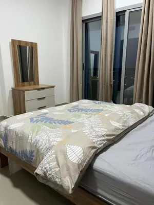 a bed with a dresser and a window in a bedroom at SEASONING STAY AT DUBA MARINA in Dubai
