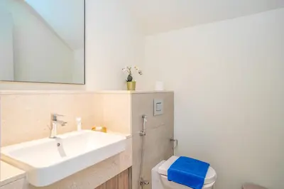 a bathroom with a sink and a toilet at New Arabian Dubai Hills villa- 3 BR & Maid Golf Grove With Private pool in Dubai