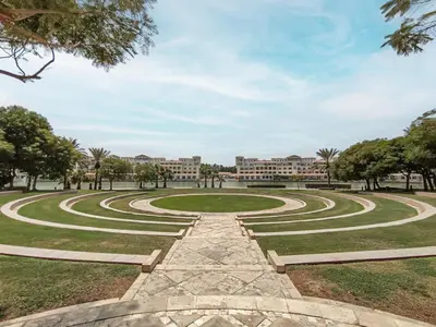 a view of a park with large labyrinths at Lake Apartments - 1BR Apartment - Allsopp&Allsopp in Dubai