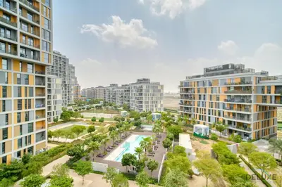 an aerial view of a city with tall buildings at Serene 1BR at Afnan 3 Midtown Dubai Production City by Deluxe Holiday Homes in Dubai