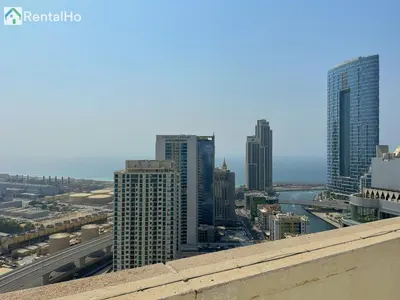 a view of a city skyline with tall buildings at Quiet Studio with Balcony and Roof Top Pool in Dubai Marina in Dubai