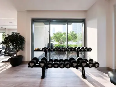 a room with a bunch of racks of wine bottles at Trophy - Downtown Skyview Residence in 35th floor in Dubai