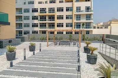 a group of stairs in front of a building at Frank Porter - Square Tower in Dubai