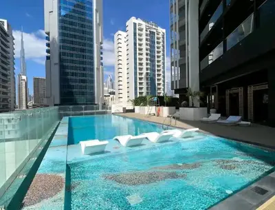 a large swimming pool on top of a building at Chez Fouzia in Dubai