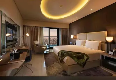 a large bedroom with a large bed and a desk at Keysplease Luxury 1 B/R Apt in Paramount Towers by Damac in Dubai