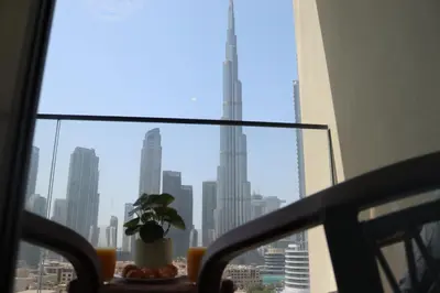 a window with a view of a city skyline at Burj Royale Residences Downtown Dubai - Burj Khalifa District in Dubai