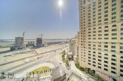 an aerial view of a city with tall buildings at Soothing 1BR at Binghatti Avenue Al Jaddaf by Deluxe Holiday Homes in Dubai