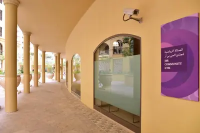 a hallway of a building with a sign on the wall at GuestReady - Luxurious Marina view residence in Dubai