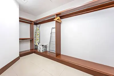 an empty room with a window and a curtain at StoneTree - 1BR apartment with Beach Access Fairmont in Palm Jumeirah in Dubai