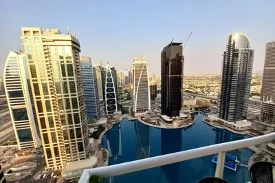 a view of a city skyline with tall buildings at StoneTree - Furnished Studio near Metro Station in Dubai