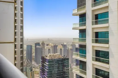 a view of a city skyline from a skyscraper at StoneTree - Sea View - High-Floor in Dubai