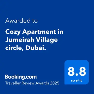 a screenshot of a phone with the text awarded to cozy appointment in juneinian at Stunning Studio in Dubai in Dubai