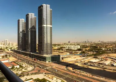 a view of a city with tall buildings and a highway at StoneTree - Family-friendly Studio in Peaceful Community in Dubai