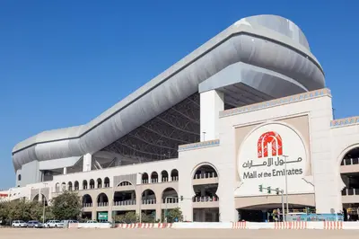 a large white building with a sign on it at Small Private Partition Room in Al Barsha 1 Near Metro in Dubai