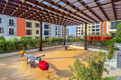a patio with a large pergola in a building at Azure Escape !Joyful 1 Bed Apartment close to the Sea! in Dubai