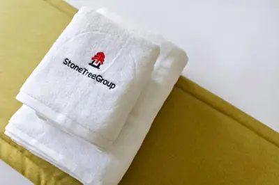 a white towel with the words comfort food on it at StoneTree - Sit Back, Relax and Your New View Awaits in Dubai