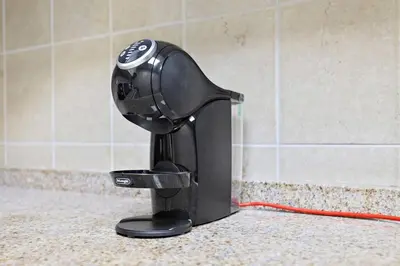 a black blow dryer sitting on a counter at StoneTree - Sit Back, Relax and Your New View Awaits in Dubai