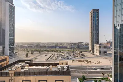 an aerial view of a city with tall buildings at Silkhaus classical 1BDR in Opera District in Dubai