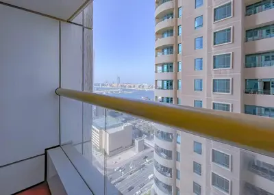 a view from the balcony of a building at StoneTree - Near Tram - Furnished 1BR in Dubai