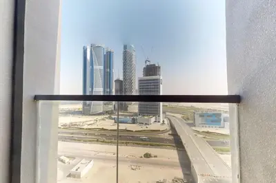 a view of a city skyline from a window at 15 Northside Tower 1 - Elegant Studio in Dubai