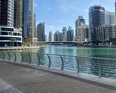 a body of water in a city with tall buildings at StoneTree - Near JBR Beach - Prime Location in Dubai