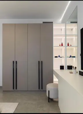 a kitchen with white cabinets and a white counter top at Mira Holiday Homes - Serviced 2 bedroom in Dubai Marina in Dubai