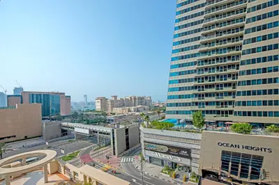 a view of a city with tall buildings at Dazzling 1BR at Marina Crown Dubai Marina by Deluxe Holiday Homes in Dubai