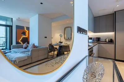 a living room with a couch and a table at 15 Northside A - Pristine Two Bedroom in Dubai
