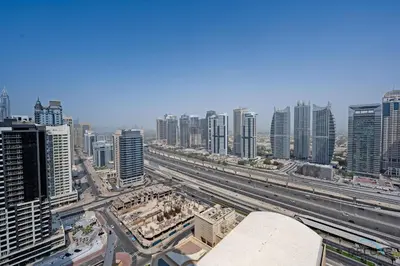 an aerial view of a city with many tall buildings at Marina Canal Views 2BR Unit Next to Marina Mall, The Address Residences, Dubai Marina by Deluxe Holiday Homes in Dubai