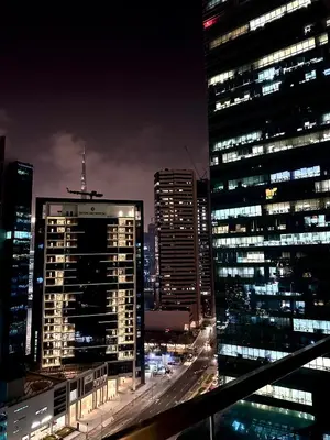 a view of a city at night with buildings at The Sand Castle - Ubora Residence Tower, Business Bay, Burj Khalifa View in Dubai