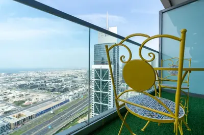 a chair on the floor of a building at Lux BnB Paramount Midtown I Ocean View in Dubai