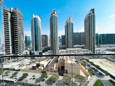 a view of a city with tall buildings at Incredible stay at Burj Royale Downtown in Dubai