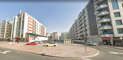 a view of a city with cars parked on a street at Lovely Partition Room in Barsha 1 Near Metro in Dubai