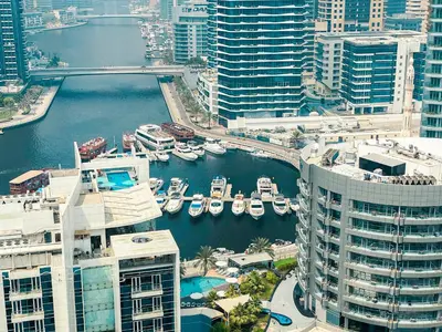 an aerial view of a harbor with boats in the water at Cozy 1 BR in Dubai Marina in Dubai