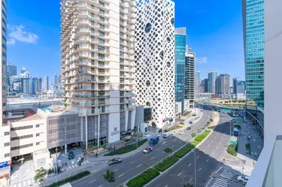 an aerial view of a city with tall buildings at Studio with Balcony Skyline View Business Bay in Dubai