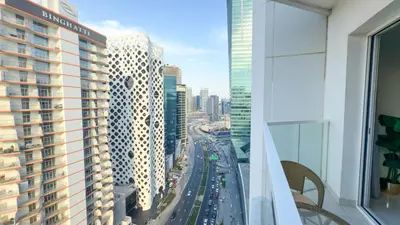 a view of a city from a building at Ahlan HH - Charming Studio at AG Tower in Dubai
