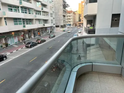 a view of a city street from a building at Prime Partition Room in Al Barsha 1 Near Metro in Dubai