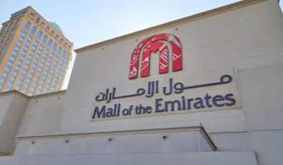 a mall of the emirates sign on a building at Cozy Partition Room Near Mashreq & MOE Metro in Dubai