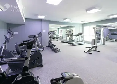 a gym with a bunch of exercise bikes in it at Elite Studio at Dubai Marina in Dubai