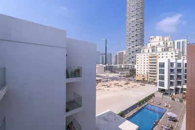 a view of a city from a building at Modern Comfort in a Spacious Apartment - Suiteable in Dubai