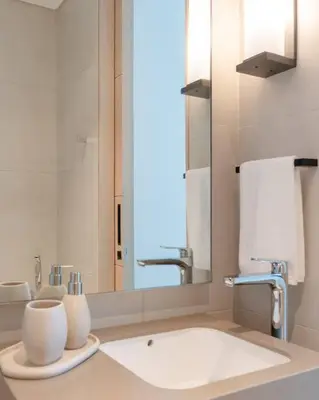 a bathroom with a sink and a mirror at 1BR •The Address Beach Residence - High floor in Dubai