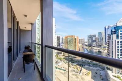 a balcony with a view of the city at Maison Privee - Classy Urban Retreat with Amazing Dubai Canal Views in Dubai