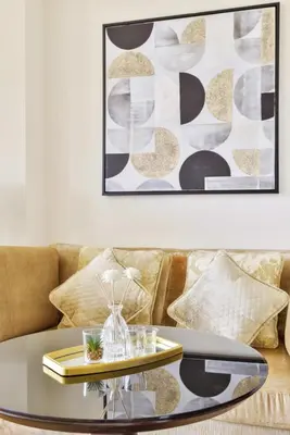 a living room with a couch and a glass table at Emaar Marina Residences - formerly Address Dubai Marina in Dubai