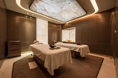 a hospital room with two beds and a ceiling at FIVE LUXE in Dubai