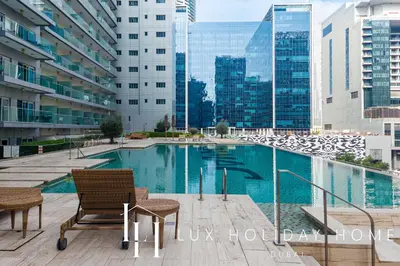 a swimming pool on the roof of a building at The Majestine Studio in Dubai