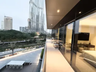 an office building with a view of the city at The Address Residences Dubai Opera, Full Burj Khalifa View, Luxurious 2BR in Dubai