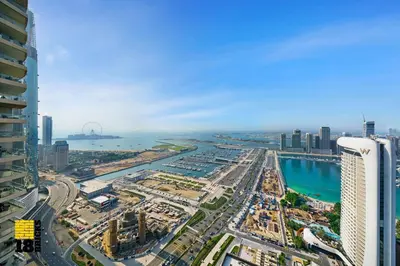 an aerial view of a city with buildings and the ocean at Lux Sea view 1BR in Dubai Marina in Dubai