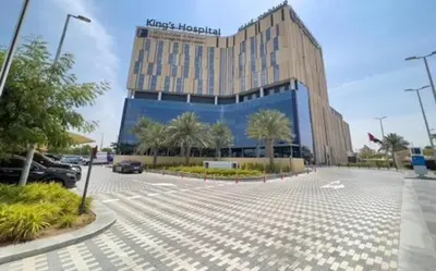 a large building in front of a parking lot at Oraya - Suburban Serenity at Spacious 4BR Villa in Maple 2 in Dubai