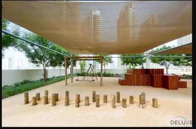 a stage in a building with a table and chairs at Stylish 2BR with Burj Khalifa View at Burj Royale Downtown Dubai by Deluxe Holiday Homes in Dubai